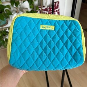 Vera Bradley Cosmetic Bag. Approximately 7” long and 9” wide.